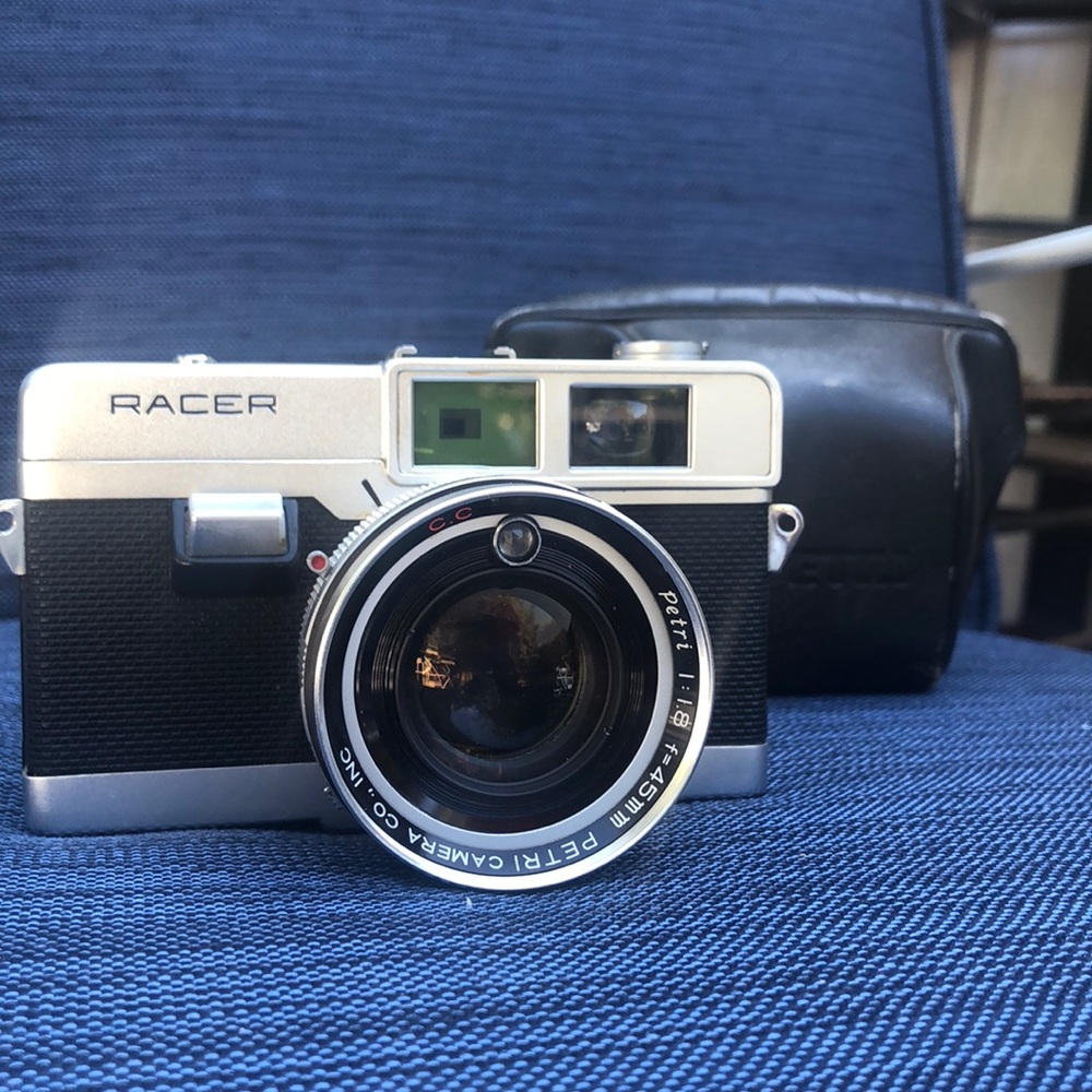 A 1966 Petri Racer camera w/ original case.
